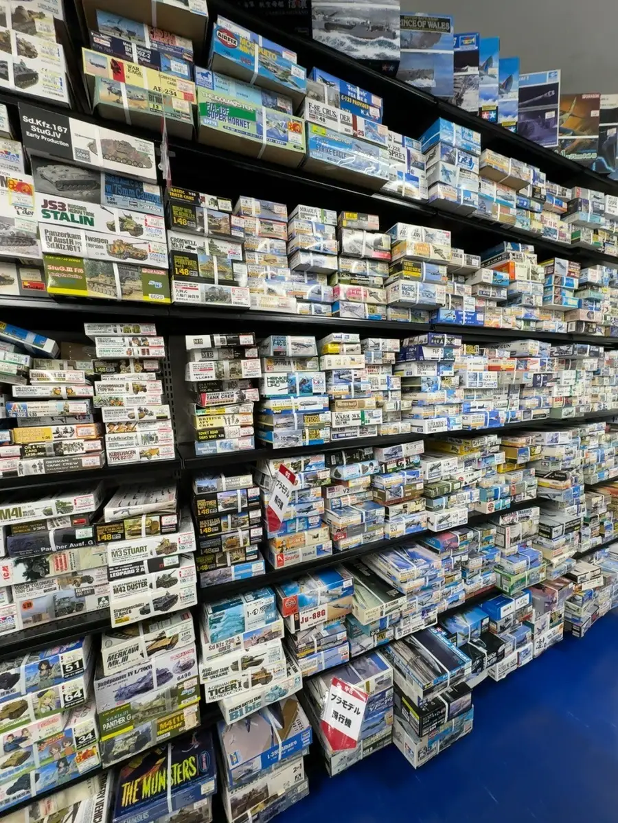 TAMIYA tank and aircraft model kit shelf